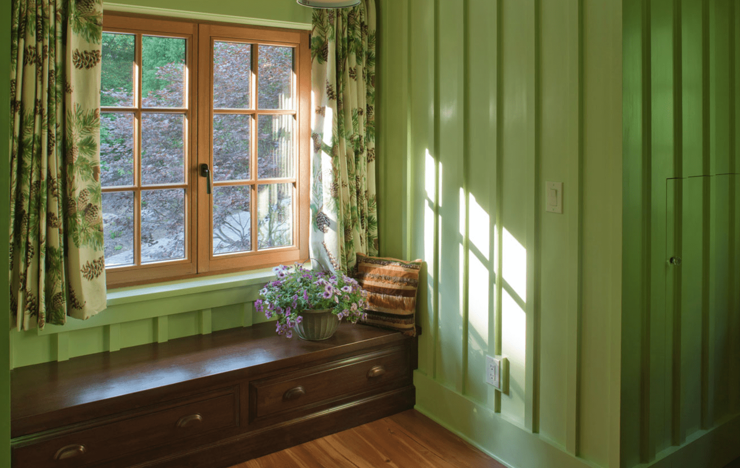 Green window seat with drawer storage